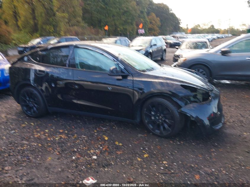 2023 Tesla Model Y Awd/Long Range Dual Motor All-Wheel Drive VIN: 7SAYGAEE1PF914992 Lot: 43515980