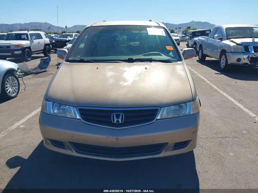 2002 Honda Odyssey Ex VIN: 2HKRL186X2H565780 Lot: 43520218