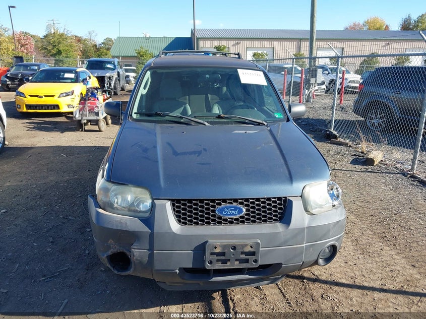 1FMCU03115KD64196 2005 FORD ESCAPE photo no. 11