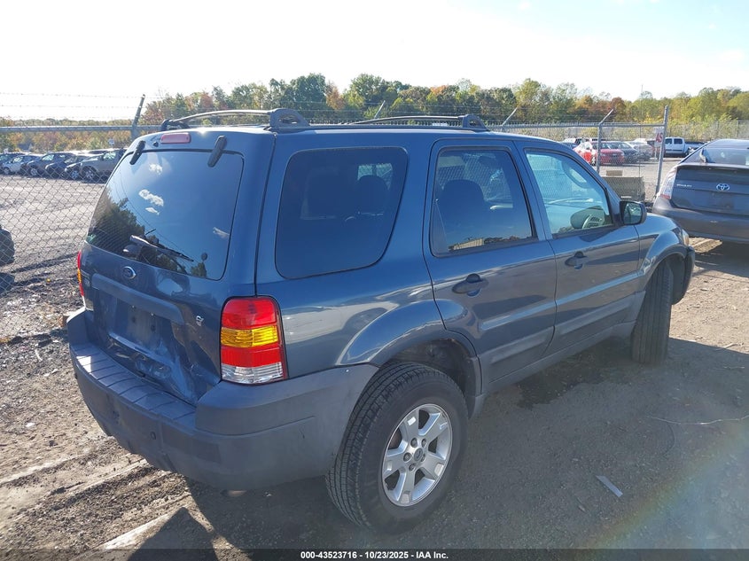 1FMCU03115KD64196 2005 FORD ESCAPE photo no. 4