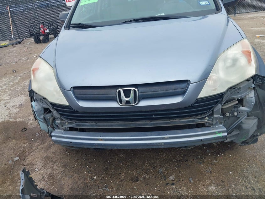 2009 Honda Cr-V Lx VIN: 3CZRE38329G706592 Lot: 43523909