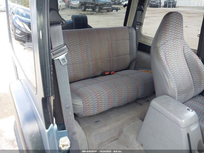 1998 Jeep Wrangler Sport VIN: 1J4FY19SXWP742221 Lot: 43529191