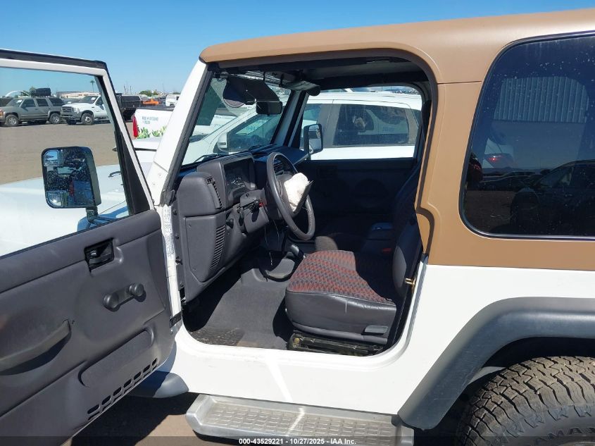 2000 Jeep Wrangler Sport VIN: 1J4FA49S6YP748610 Lot: 43529221