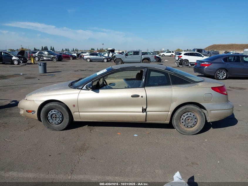 1999 Saturn Sc1 VIN: 1G8ZP1287XZ335011 Lot: 43541615