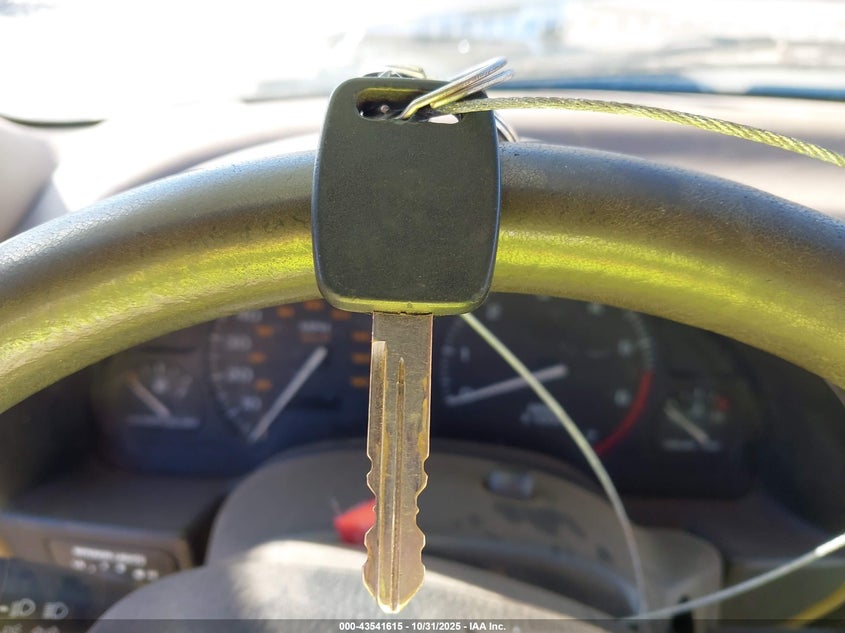 1999 Saturn Sc1 VIN: 1G8ZP1287XZ335011 Lot: 43541615