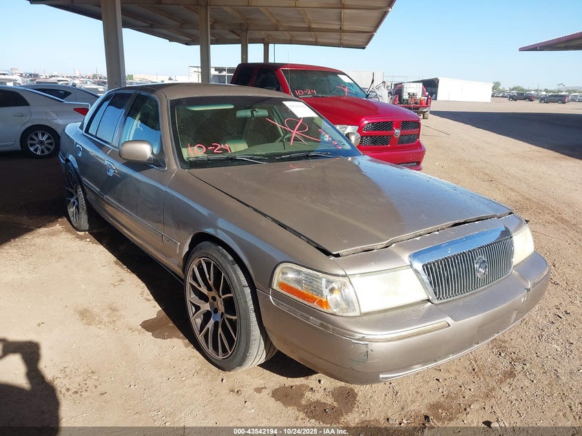 2003 Mercury Grand Marquis Gs cream sedan gasoline 2MEFM74W73X669618 photo #1