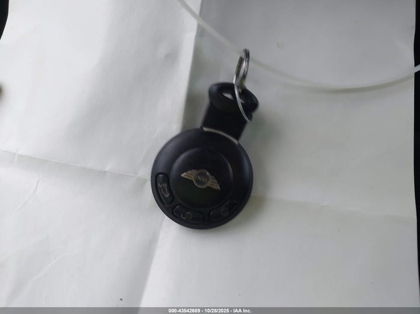 2009 Mini Cooper VIN: WMWMF33569TW73893 Lot: 43542689