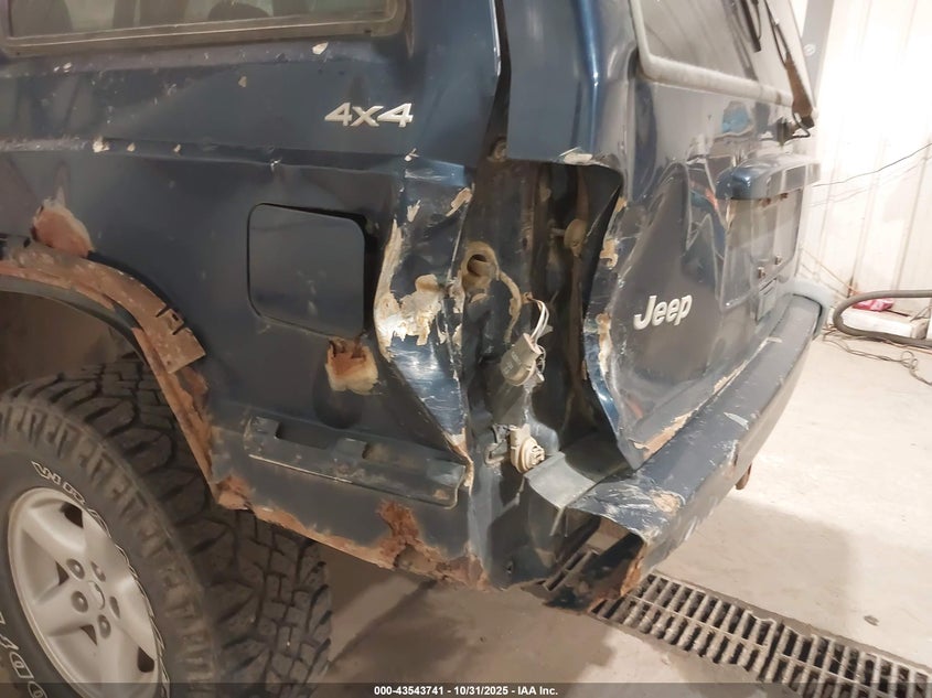 2001 Jeep Cherokee Sport VIN: 1J4FF48S11L602728 Lot: 43543741