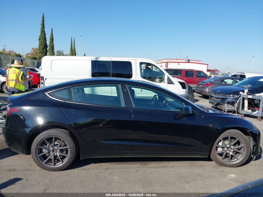 2023 Tesla Model 3 Rear-Wheel Drive VIN: 5YJ3E1EA9PF709737 Lot: 43545530