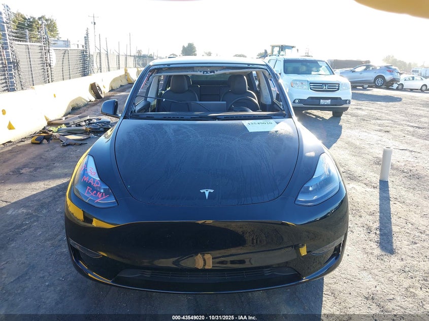2025 Tesla Model Y Long Range Dual Motor All-Wheel Drive VIN: 7SAYGAEE5SF216328 Lot: 43549020