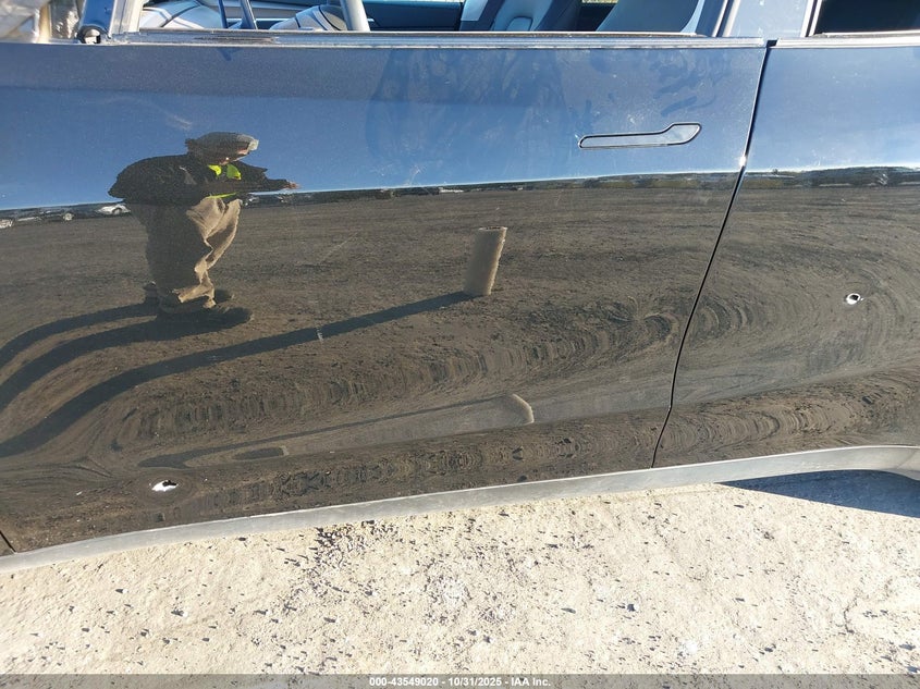 2025 Tesla Model Y Long Range Dual Motor All-Wheel Drive VIN: 7SAYGAEE5SF216328 Lot: 43549020