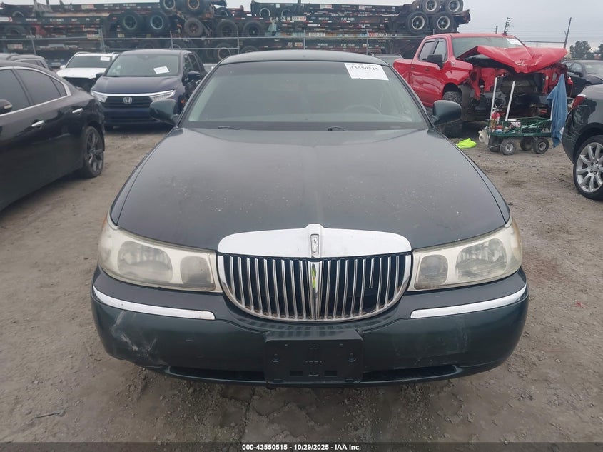 1999 Lincoln Town Car Signature VIN: 1LNHM82W6XY617045 Lot: 43550515