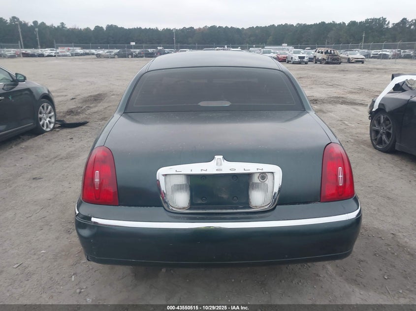 1999 Lincoln Town Car Signature VIN: 1LNHM82W6XY617045 Lot: 43550515