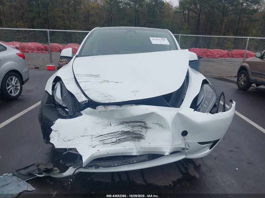 2023 Tesla Model Y Awd/Long Range Dual Motor All-Wheel Drive VIN: 7SAYGDEE0PF614667 Lot: 43552360