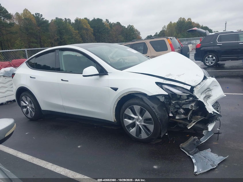 2023 Tesla Model Y Awd/Long Range Dual Motor All-Wheel Drive VIN: 7SAYGDEE0PF614667 Lot: 43552360