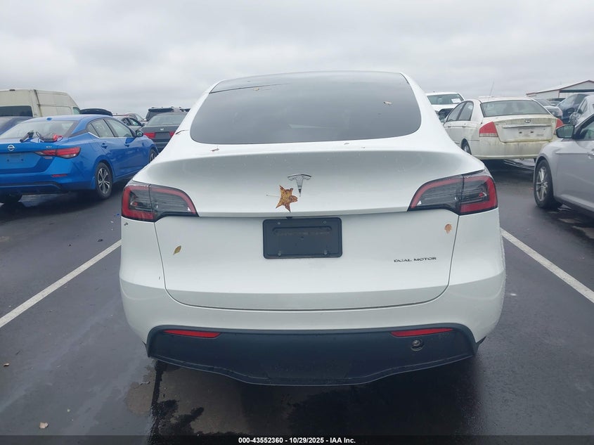 2023 Tesla Model Y Awd/Long Range Dual Motor All-Wheel Drive VIN: 7SAYGDEE0PF614667 Lot: 43552360