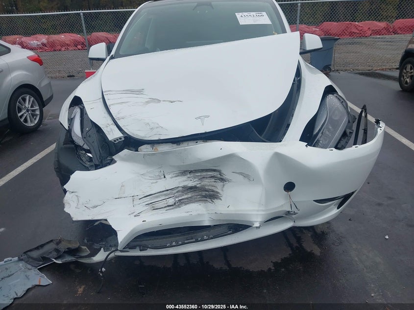 2023 Tesla Model Y Awd/Long Range Dual Motor All-Wheel Drive VIN: 7SAYGDEE0PF614667 Lot: 43552360