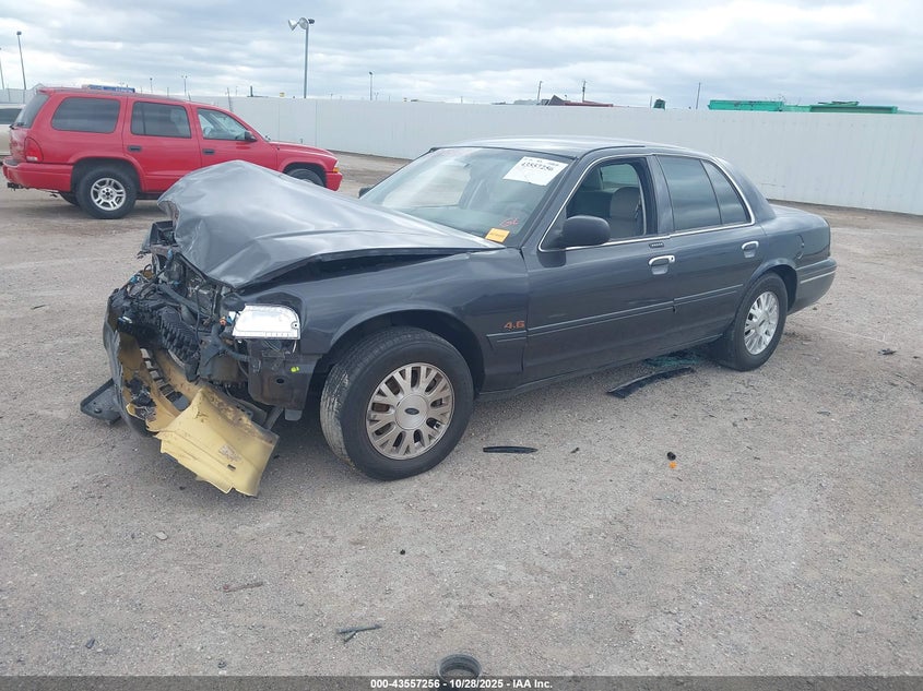 2004 Ford Crown Victoria Lx VIN: 2FAHP74W74X156121 Lot: 43557256
