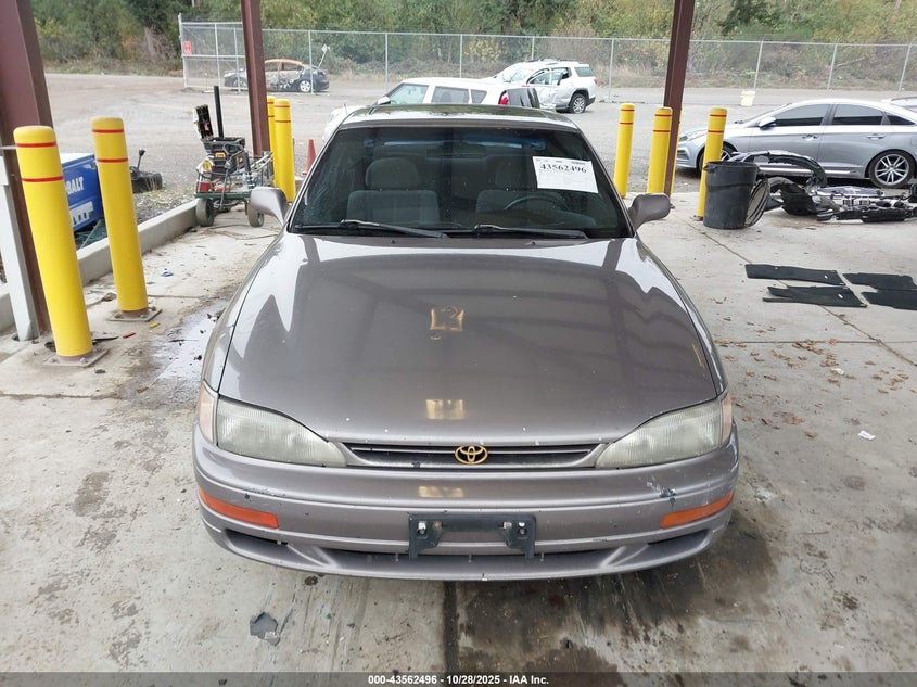 1995 Toyota Camry Le VIN: 4T1SK12C5SU476123 Lot: 43562496