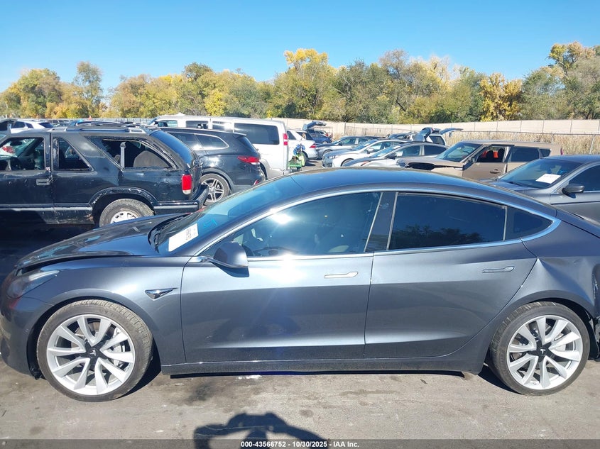 2018 Tesla Model 3 Long Range/Performance VIN: 5YJ3E1EB5JF100421 Lot: 43566752