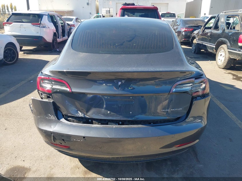 2018 Tesla Model 3 Long Range/Performance VIN: 5YJ3E1EB5JF100421 Lot: 43566752
