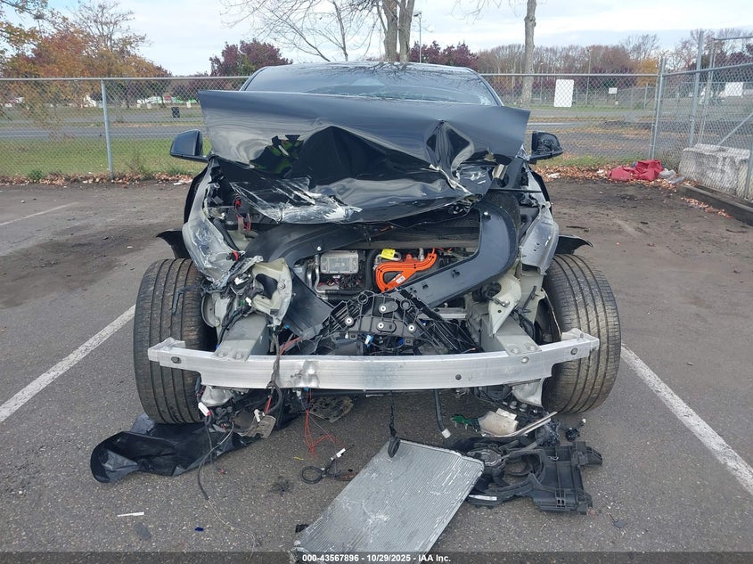 2025 Tesla Model Y Long Range Dual Motor All-Wheel Drive VIN: 7SAYGAEE0SF285203 Lot: 43567896