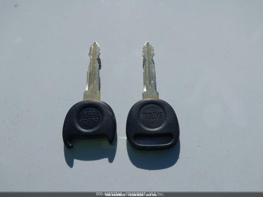 2000 Saturn Sl1 VIN: 1G8ZH5284YZ101401 Lot: 43569020