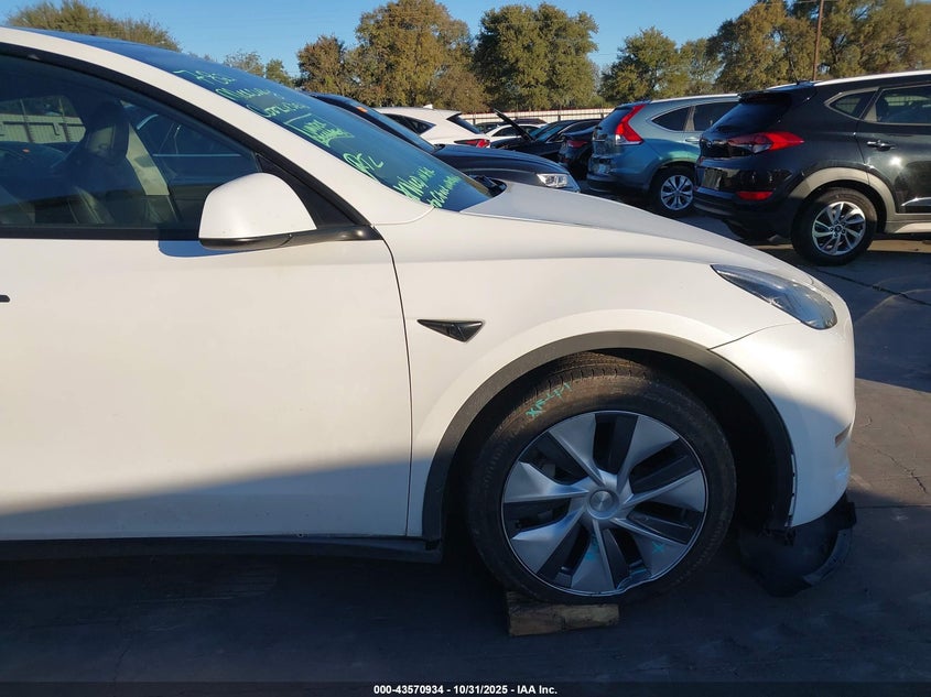 2023 Tesla Model Y Awd/Long Range Dual Motor All-Wheel Drive VIN: 7SAYGDEE2PA058634 Lot: 43570934