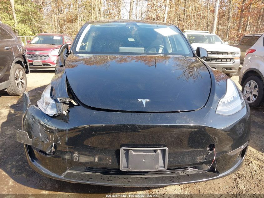 2023 Tesla Model Y Awd/Long Range Dual Motor All-Wheel Drive VIN: 7SAYGAEEXPF606445 Lot: 43571843