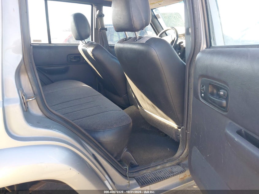 2001 Jeep Cherokee Limited/Sport VIN: 1J4FF58SX1L558699 Lot: 43572328