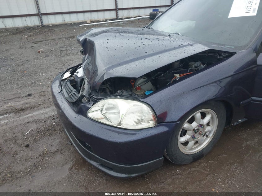 1998 Honda Civic Dx VIN: 2HGEJ6435WH001144 Lot: 43572531