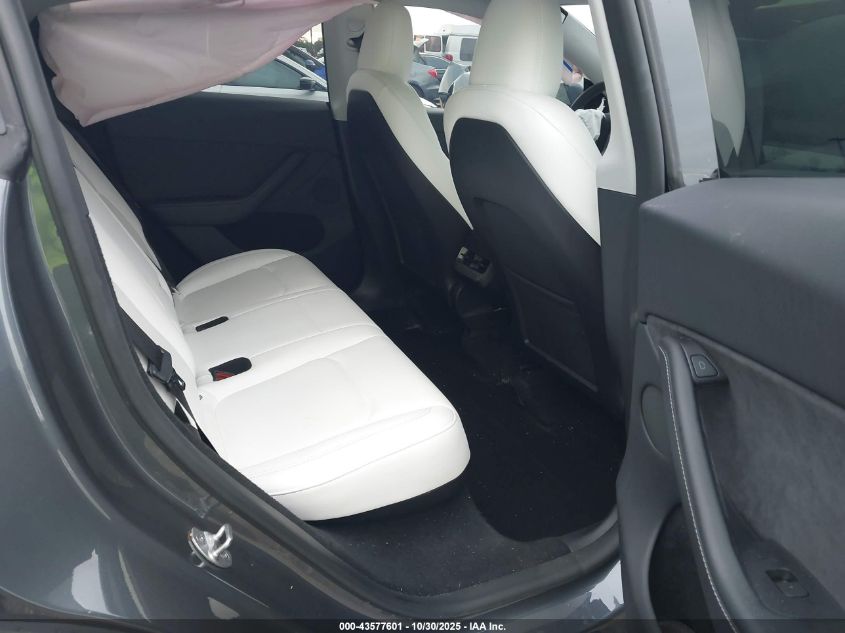 2023 Tesla Model Y Awd/Long Range Dual Motor All-Wheel Drive VIN: 7SAYGDEE2PA206748 Lot: 43577601