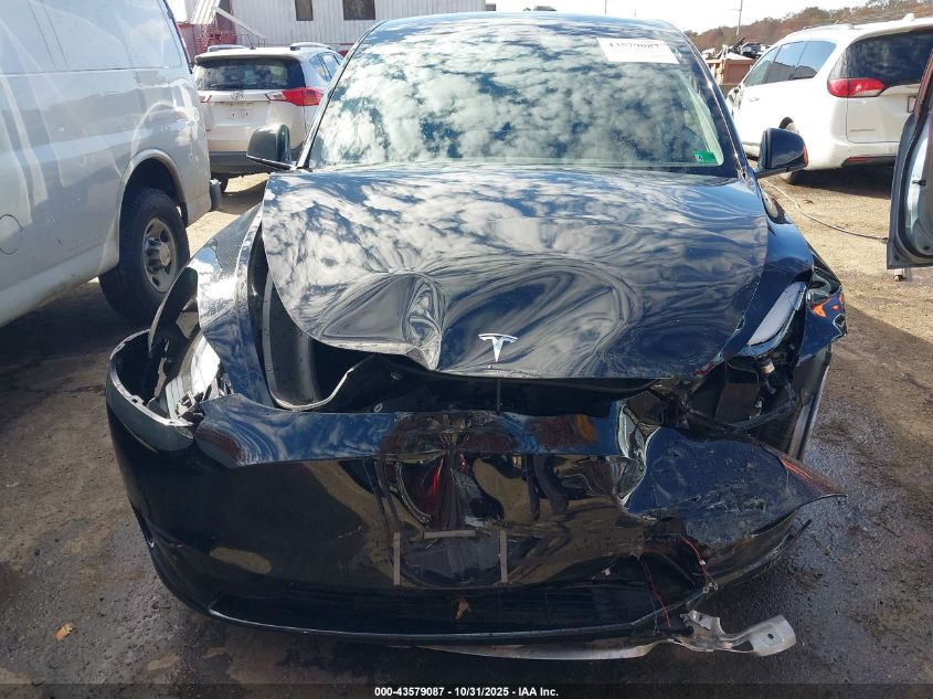 2024 Tesla Model Y Long Range Dual Motor All-Wheel Drive VIN: 7SAYGDEEXRA218228 Lot: 43579087