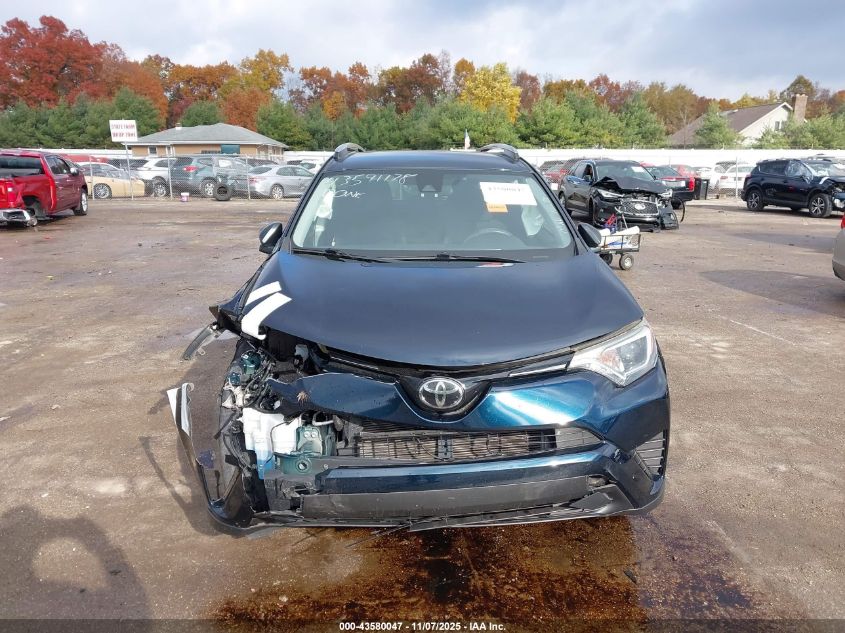 2018 Toyota Rav4 Le VIN: JTMBFREV7JJ235426 Lot: 43580047