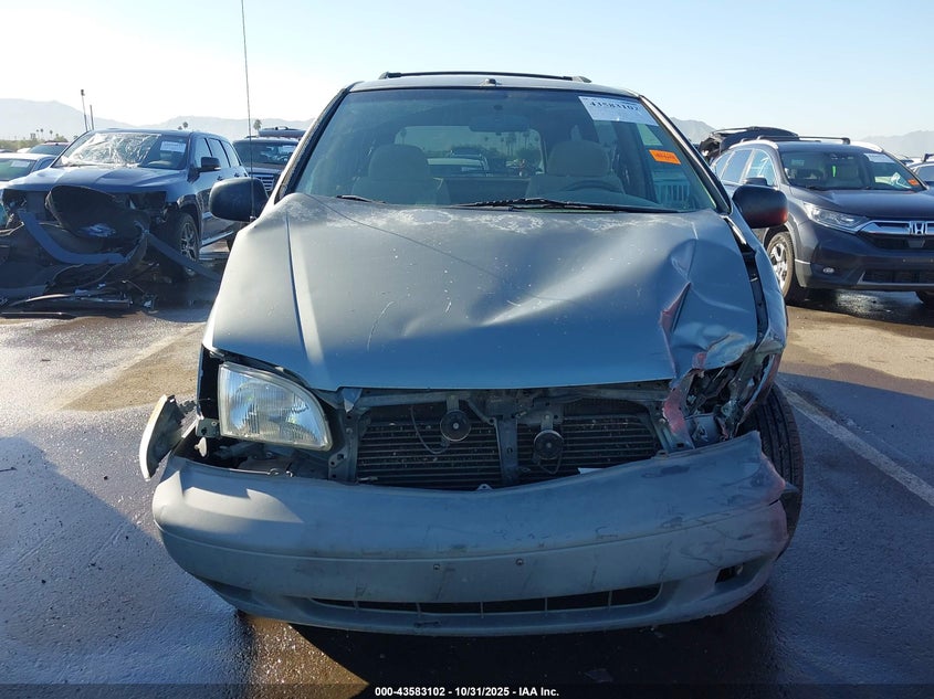 1999 Toyota Sienna Le VIN: 4T3ZF13CXXU114708 Lot: 43583102