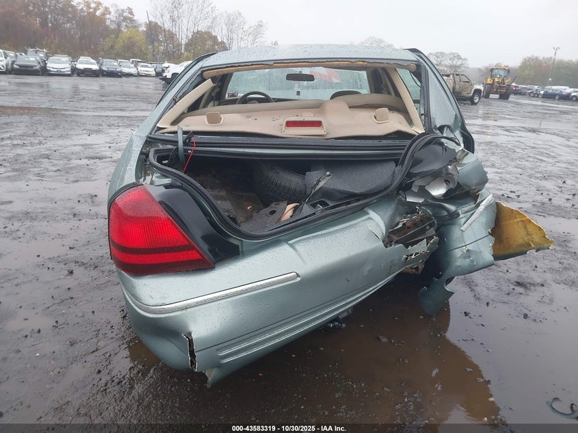 2005 Mercury Grand Marquis Gs VIN: 2MEFM74W85X668853 Lot: 43583319