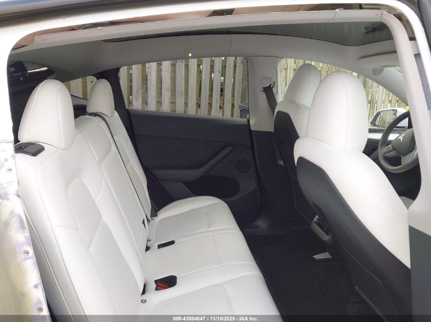 2023 Tesla Model Y Awd/Long Range Dual Motor All-Wheel Drive VIN: 7SAYGDEE2PA192866 Lot: 43584047