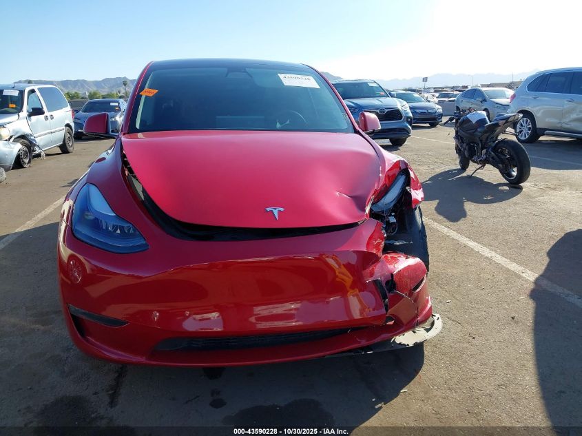 2023 Tesla Model Y Awd/Long Range Dual Motor All-Wheel Drive VIN: 7SAYGDEE1PF668687 Lot: 43590228