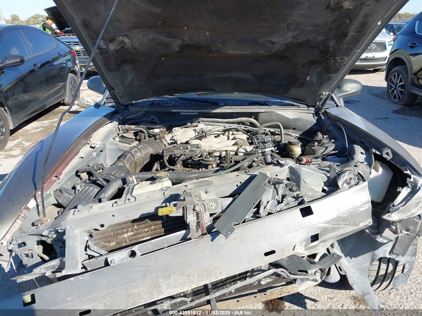 2002 Ford Mustang VIN: 1FAFP404X2F242476 Lot: 43591612