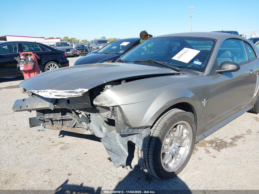 2002 Ford Mustang VIN: 1FAFP404X2F242476 Lot: 43591612