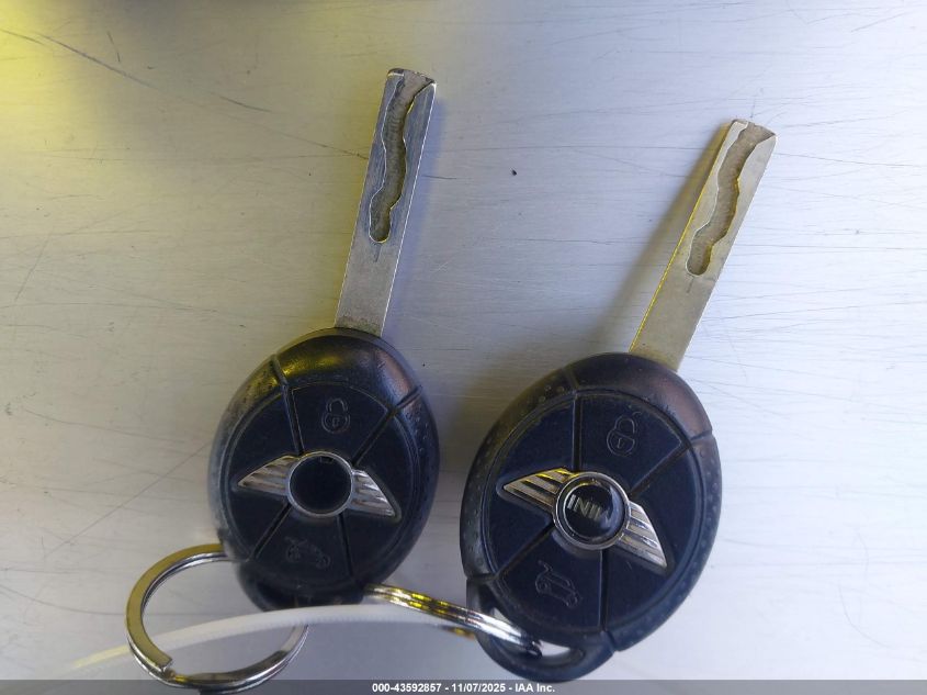 2006 Mini Cooper VIN: WMWRF33576TG14873 Lot: 43592857