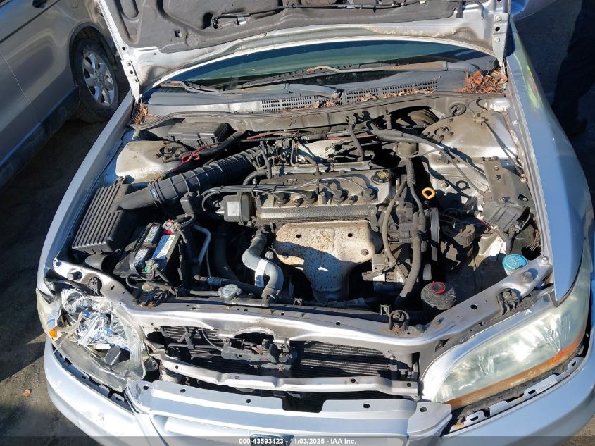 2002 Honda Accord 2.3 Lx VIN: 1HGCG32462A010864 Lot: 43593423