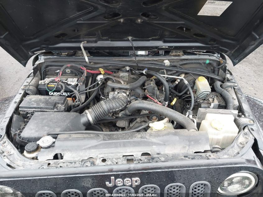 2007 Jeep Wrangler Unlimited Sahara VIN: 1J4GA59177L138495 Lot: 43594423