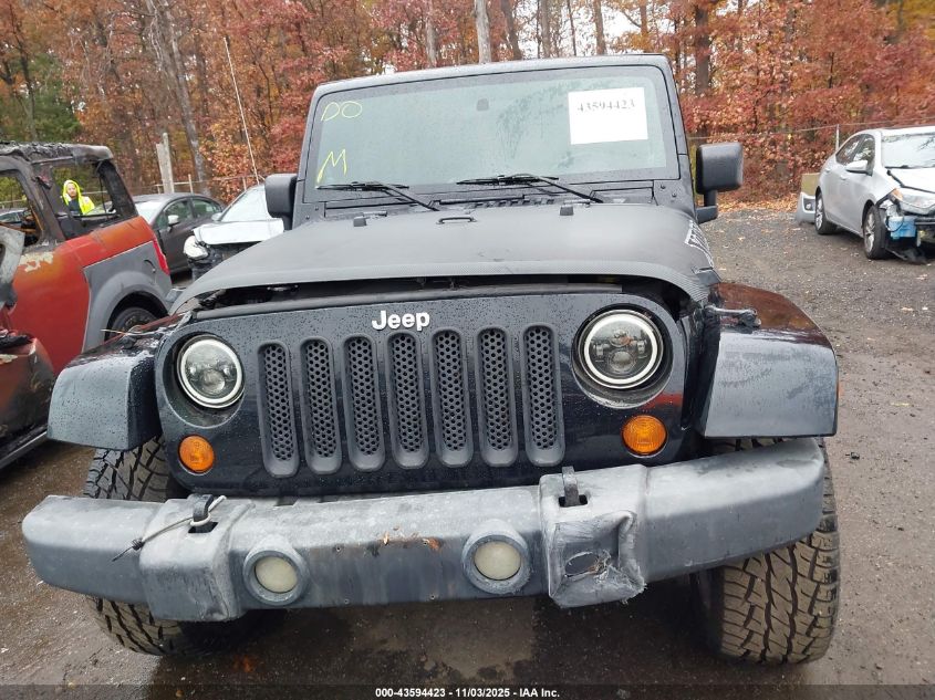 2007 Jeep Wrangler Unlimited Sahara VIN: 1J4GA59177L138495 Lot: 43594423