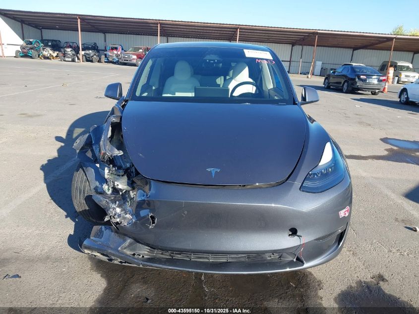 2023 Tesla Model Y Performance Dual Motor All-Wheel Drive VIN: 7SAYGDEF3PF864400 Lot: 43595150
