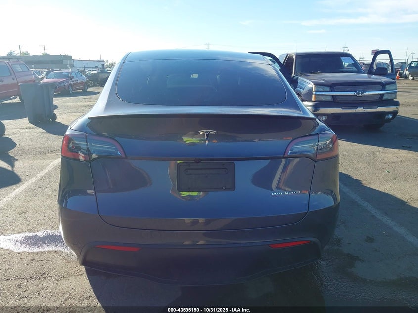 2023 Tesla Model Y Performance Dual Motor All-Wheel Drive VIN: 7SAYGDEF3PF864400 Lot: 43595150