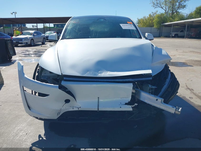 2026 Tesla Model Y Long Range Dual Motor All-Wheel Drive/Long Range Launch Series VIN: 7SAYGDEE8TA390720 Lot: 43595518