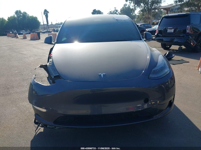 2023 Tesla Model Y Awd/Long Range Dual Motor All-Wheel Drive VIN: 7SAYGAEE4PF609339 Lot: 43596733
