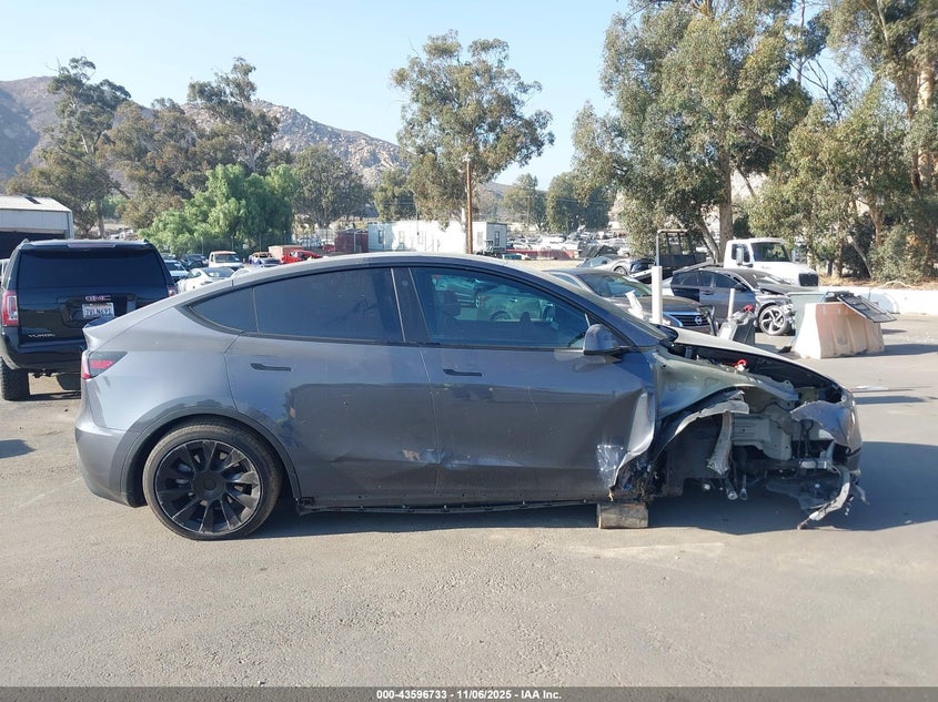 2023 Tesla Model Y Awd/Long Range Dual Motor All-Wheel Drive VIN: 7SAYGAEE4PF609339 Lot: 43596733