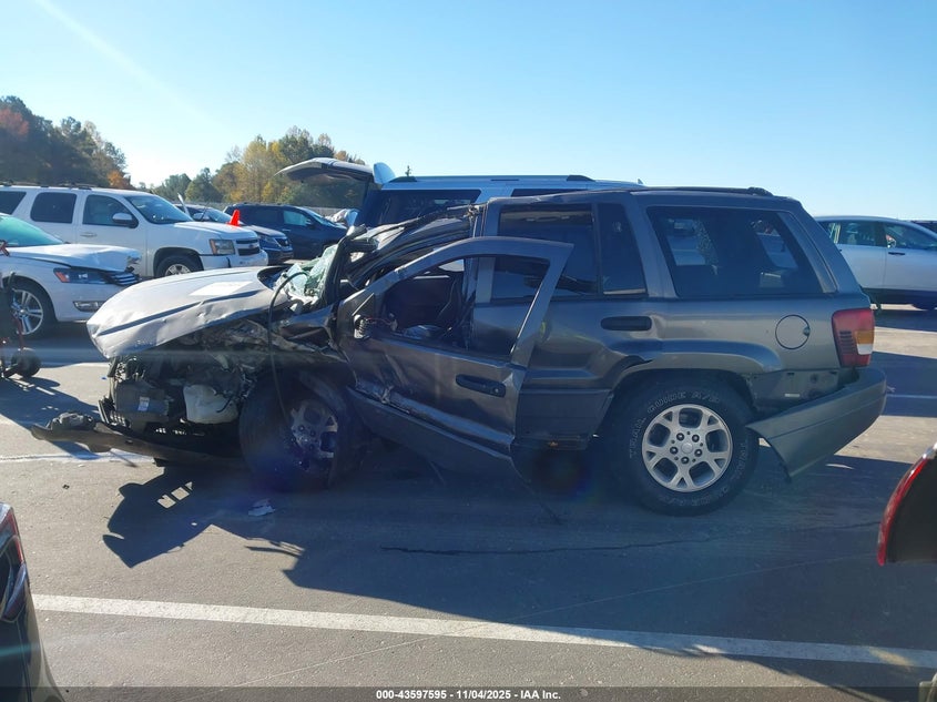 2002 Jeep Grand Cherokee Sport VIN: 1J4GW38S72C253509 Lot: 43597595